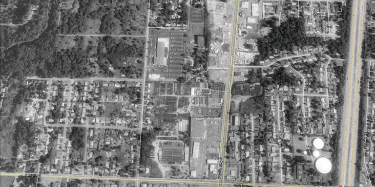 Aerial photograph of residential neighborhoods on DMCBP site in1990. 